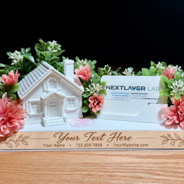 Personalized 3D-printed house display with floral decor, business card holder and engraved wooden nameplate